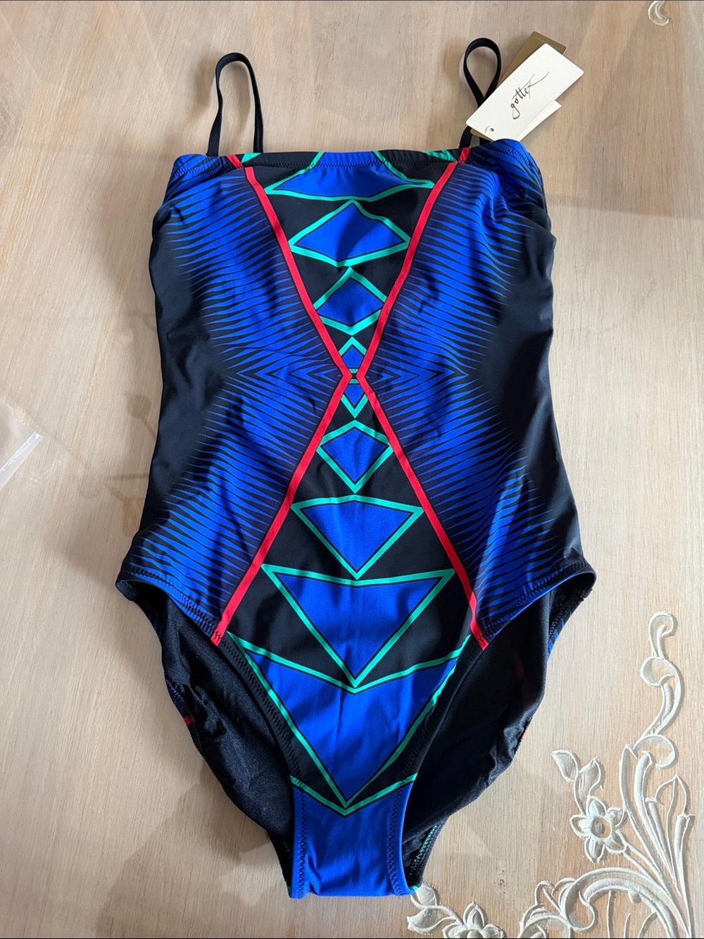 Girls Blue Geometric One-Piece Swimsuit by gottex runs a bit tight